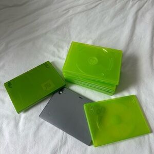 10 empty Xbox game cases